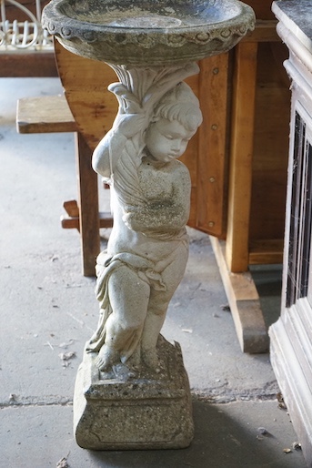 A reconstituted stone figural garden bird bath, height 89cm